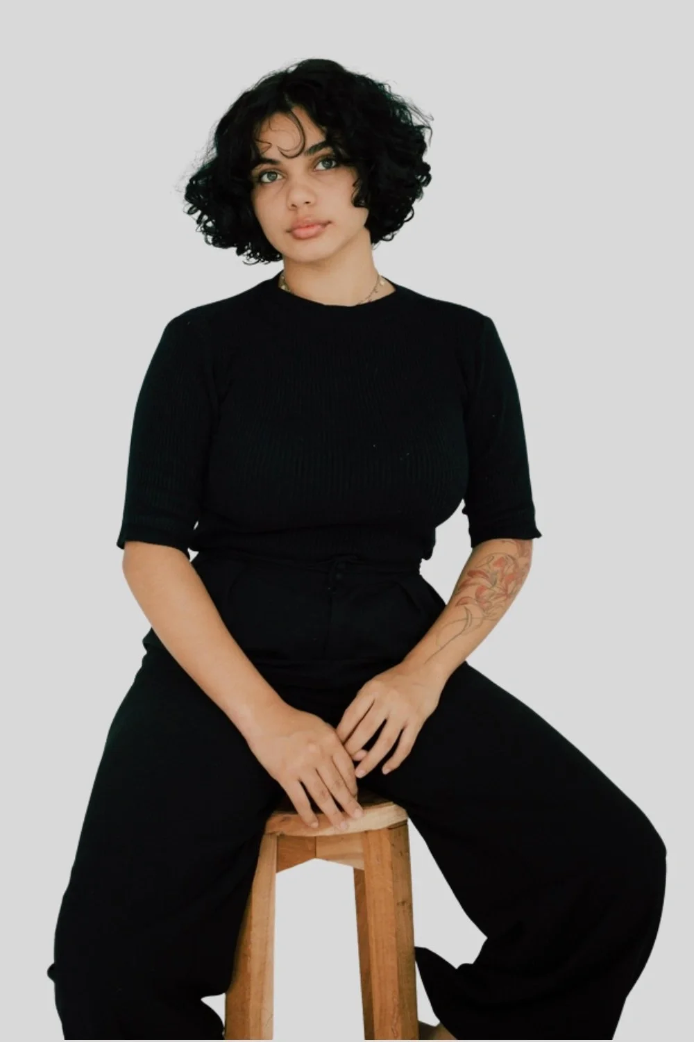 Front view of unisex T-shirts Black Oversized T-Shirt – Soft Cotton Minimal Style
